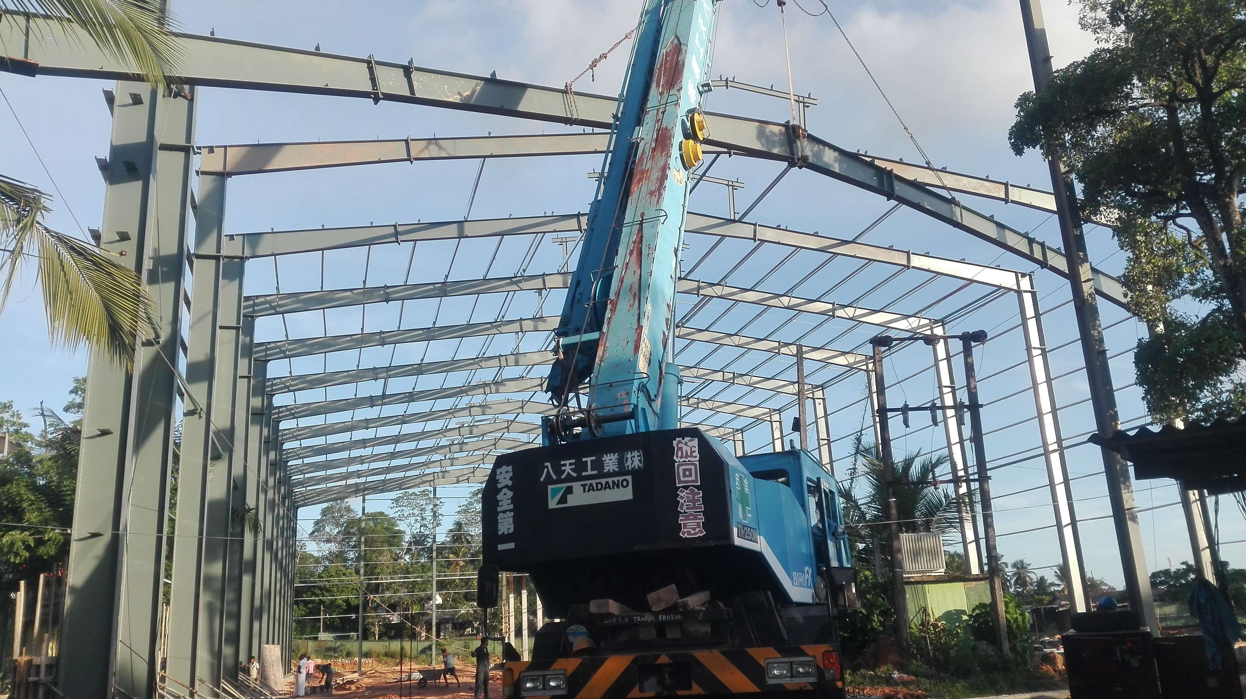 Close up of construction vehicle tire at sunset.